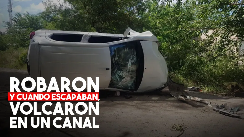Robaron, huyeron en un auto y perdieron el control: volcaron en un canal