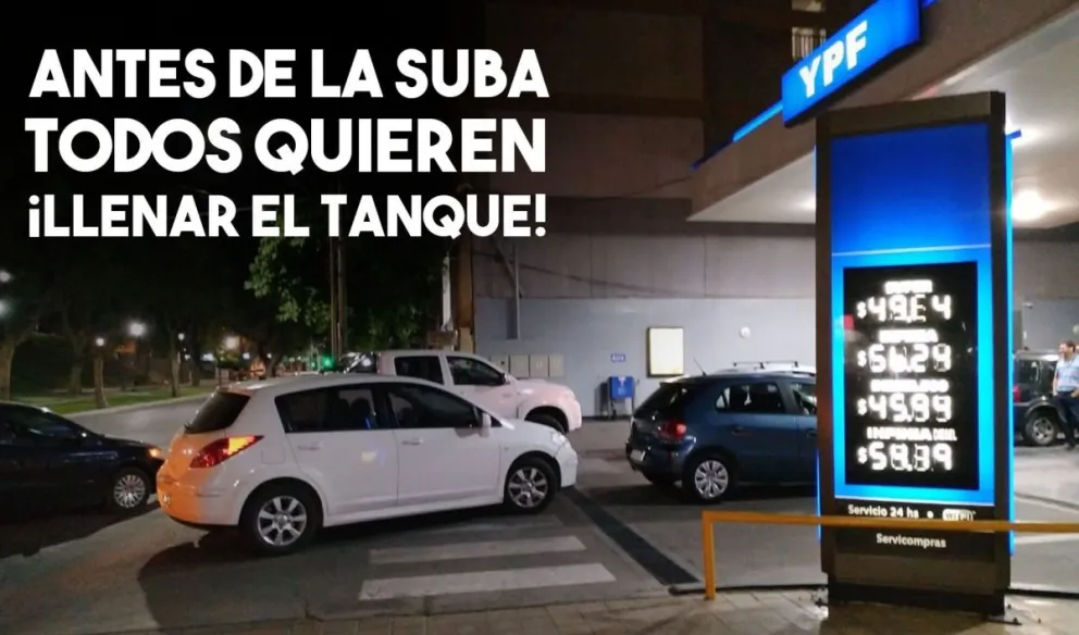 Antes de la suba, hay largas filas de autos para cargar combustible